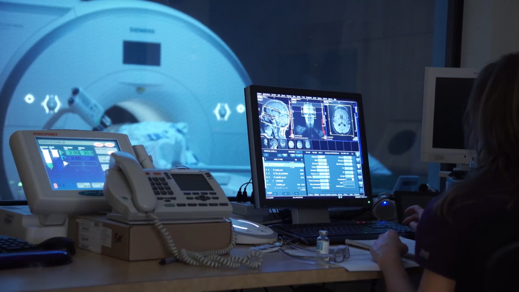 Image 2 Shot of MRI Operator Desk and MRI Unit