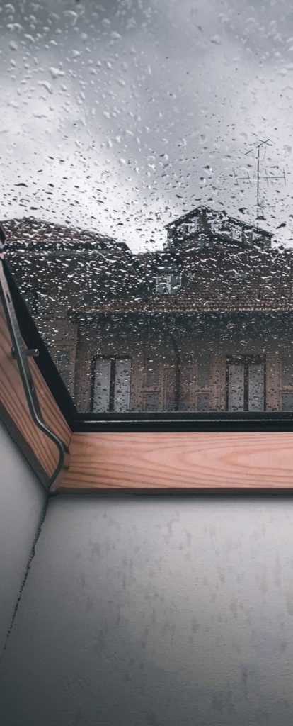Rainwater beading up on traditional skylight